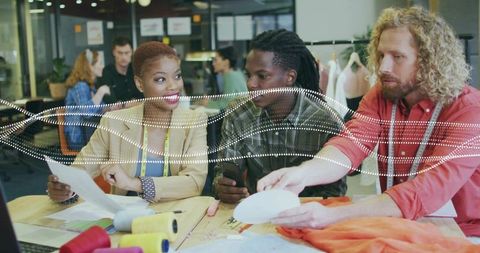 Creative Fashion Designers Meeting in Studio with Materials