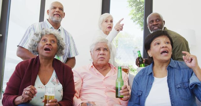 Diverse Senior Group Watching Television And Reacting - Download Free Stock Images Pikwizard.com