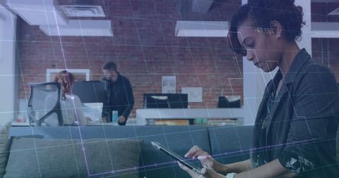 Business Technology Integration with Woman Using Tablet in Office