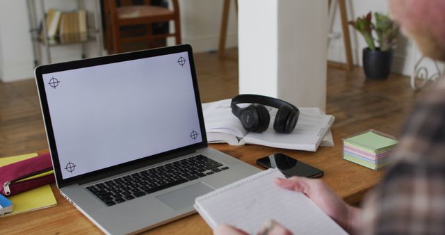 Person Taking Notes by Laptop in Home Office - Download Free Stock Images Pikwizard.com