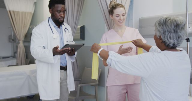 Doctor and Nurse Assisting Patient with Physical Therapy Exercise - Download Free Stock Images Pikwizard.com