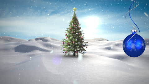 Christmas Tree in Snowy Landscape with Blue Bauble Ornament