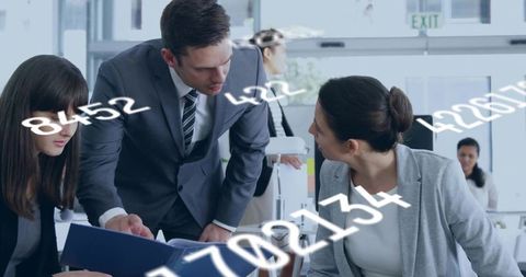 Business Team Collaborating with Data Overlays in Modern Office Space