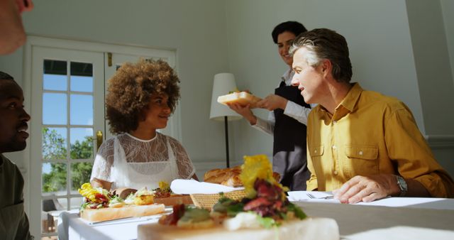 Mixed Group of Friends Having Lunch in Bright Dining Room - Download Free Stock Images Pikwizard.com