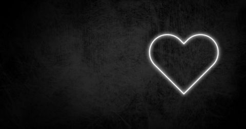 Glowing Neon Heart on Black Background Symbolizing Love - Download Free Stock Images Pikwizard.com