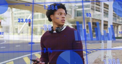 Urban Professional Analyzing Digital Charts Outdoors