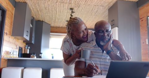 Senior Couple Experiencing Joyful Moment With Modern Technology