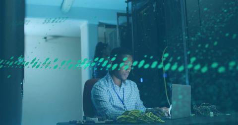 Tech Professional Analyzing Data Streams in Server Room - Download Free Stock Images Pikwizard.com