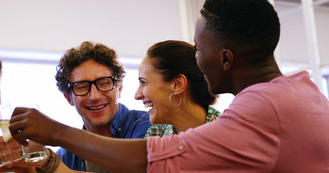 Group of Friends Celebrating and Laughing Together Indoors - Download Free Stock Images Pikwizard.com