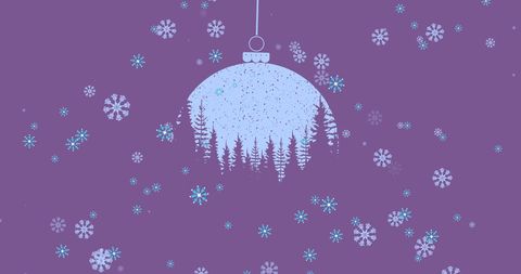 Christmas ornament with winter wonderland design on pink background