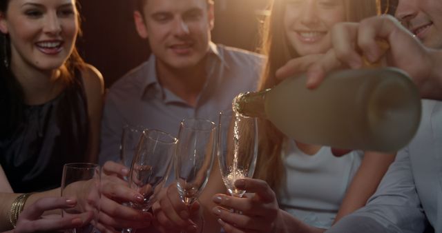 Friends Toasting With Champagne at Celebration Event - Download Free Stock Images Pikwizard.com