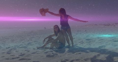 Romantic beach scene under mystic starry sky with couple