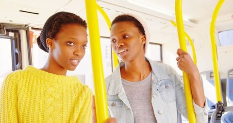 Twin Sisters Enjoying Bus Ride Together