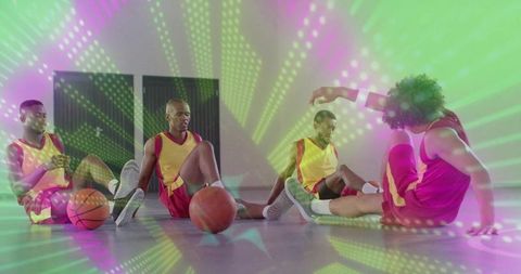 Basketball Players Taking Break with Vibrant Light Effects on Court