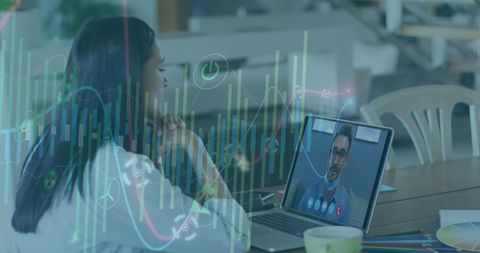 Colleague Engaged in Online Business Meeting on Laptop