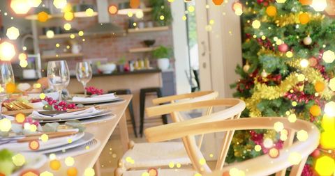 Festive Dining Table Setup with Christmas Tree