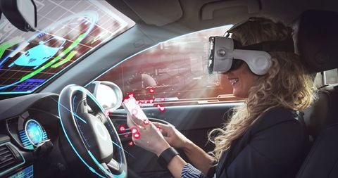 Woman Experiencing Virtual Reality in Autonomous Car - Download Free Stock Images Pikwizard.com