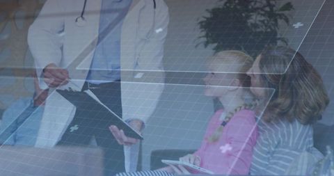 Doctor Consulting Mother and Daughter at Clinic with Integrated Graphics