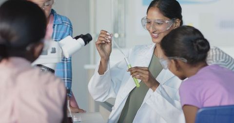 Science Teacher Demonstrating Experiment to Engaged Students - Download Free Stock Images Pikwizard.com