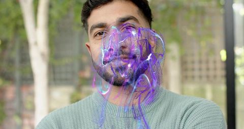 Bearded Man Portrait Wearing Mint Knit Sweater with Iridescent Purple Overlay in Garden
