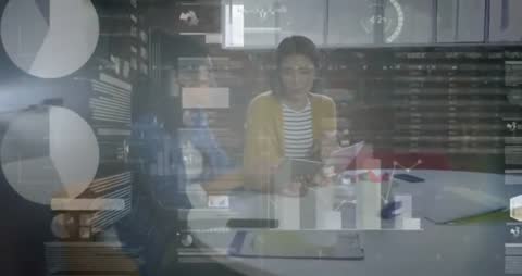 Business Team Collaborating with Tablet and Augmented Data Visuals in Office Roundtable Video