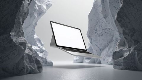 Floating Laptop in Abstract Minimalist Stone Structures