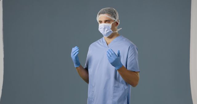 Male Nurse Wearing Mask and Gloves Preparing for Medical Procedure - Download Free Stock Images Pikwizard.com