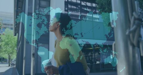Woman Holding Coffee with Overlay of World Map - Download Free Stock Images Pikwizard.com