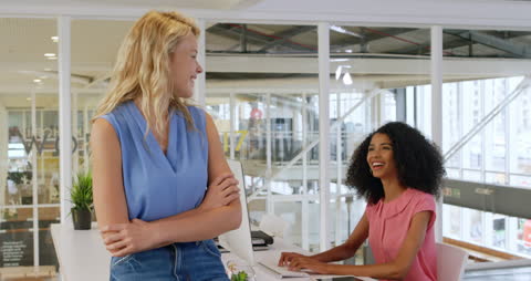 Diverse Colleagues Enjoying Work in Modern Office