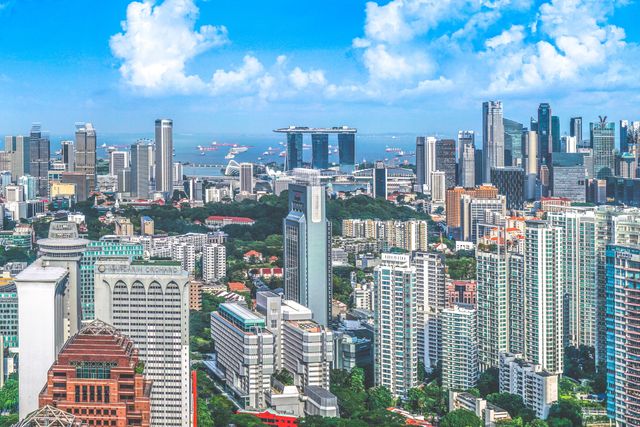 Panoramic view of Singapore skyline and Marina Bay Sands - Download Free Stock Photos Pikwizard.com