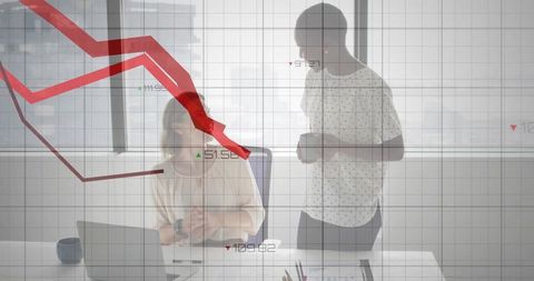 Colleagues analyzing falling red financial chart overlay during office collaboration