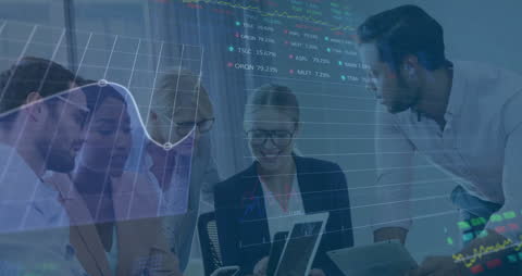 Diverse Team Analyzing Data on Digital Interfaces