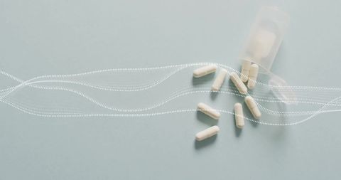 Conceptual image of capsules with digital abstract lines