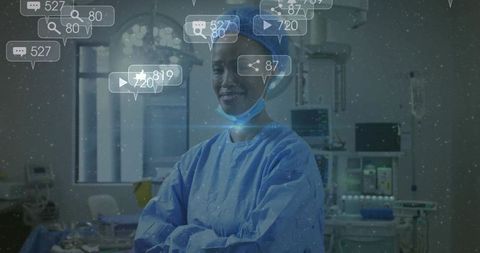Surgeon standing in operating room wearing cap and lowered mask with social media overlay