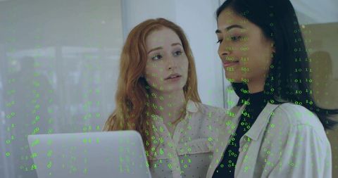 Diverse Female Professionals Collaborating with Digital Technology Overlay