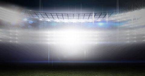 Floodlit Sports Stadium with Bokeh and Moving Lights