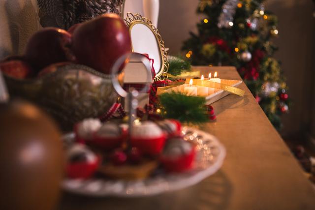 Various christmas decorations on wooden table