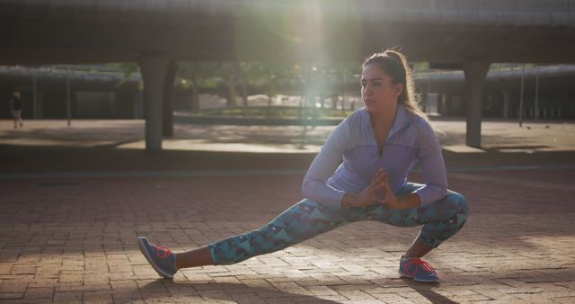 Woman Stretching Outdoors at Sunrise - Download Free Stock Images Pikwizard.com