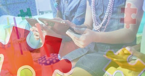 Children Using Devices with Overlay of Puzzle Pieces Promotes Autism Awareness