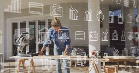 Carpenter Planning Project with Virtual Financial Icons Overlay