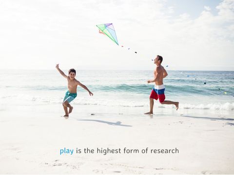 father and child flying kite on sunny beach - Download Free Stock Templates Pikwizard.com