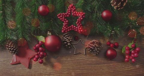 Festive Christmas Decor with Pine Branches and Red Accents