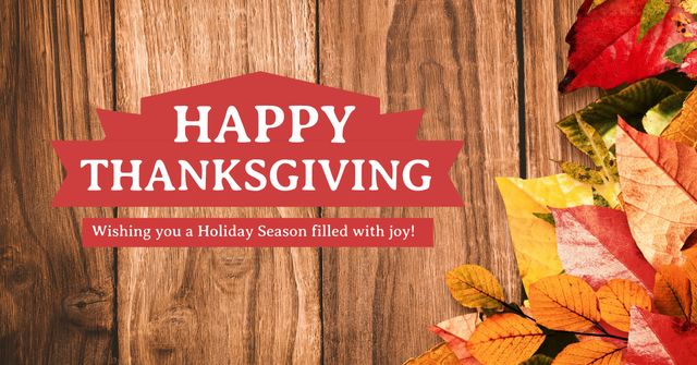 This Thanksgiving greeting image with vibrant autumn leaves on a wooden background is perfect for festive holiday messages, event invitations, social media posts, and seasonal decor. Use it to add a warm, rustic touch to any fall-related content, whether for personal or professional use.