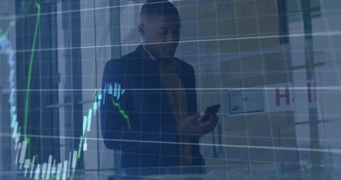 Businessman Analyzing Financial Data with Stock Market Graph Overlay