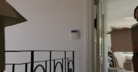 Happy couple starting fresh in new home unpacking boxes