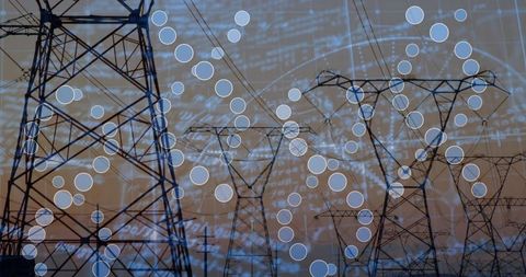 Monitoring smart power grid with data overlay on transmission towers at sunrise