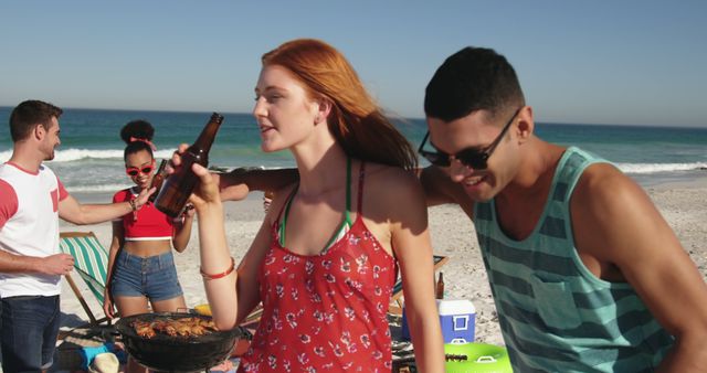 Friends Enjoying Beach Barbecue in Sunshine - Download Free Stock Images Pikwizard.com