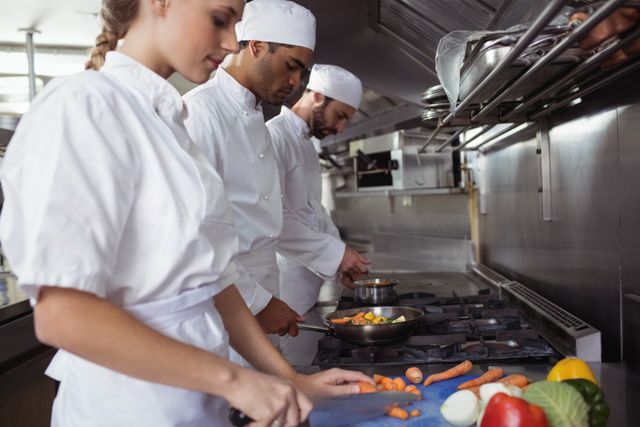 Chefs Preparing Vegetables in Commercial Kitchen - Download Free Stock Photos Pikwizard.com