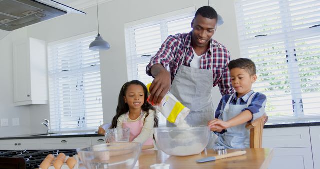 Father and children baking together in modern kitchen, providing valuable skills and fun memories. This image is perfect for ads promoting family activities, educational cooking programs for kids, or parenting blog articles emphasizing family bonding and practical skills.
