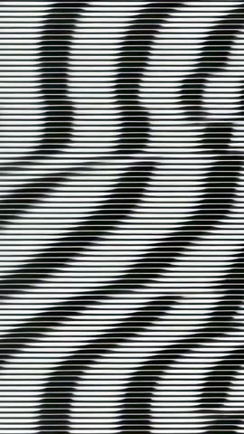 Vertical video glitching zebra stripes restoring into clean pattern on digital feed